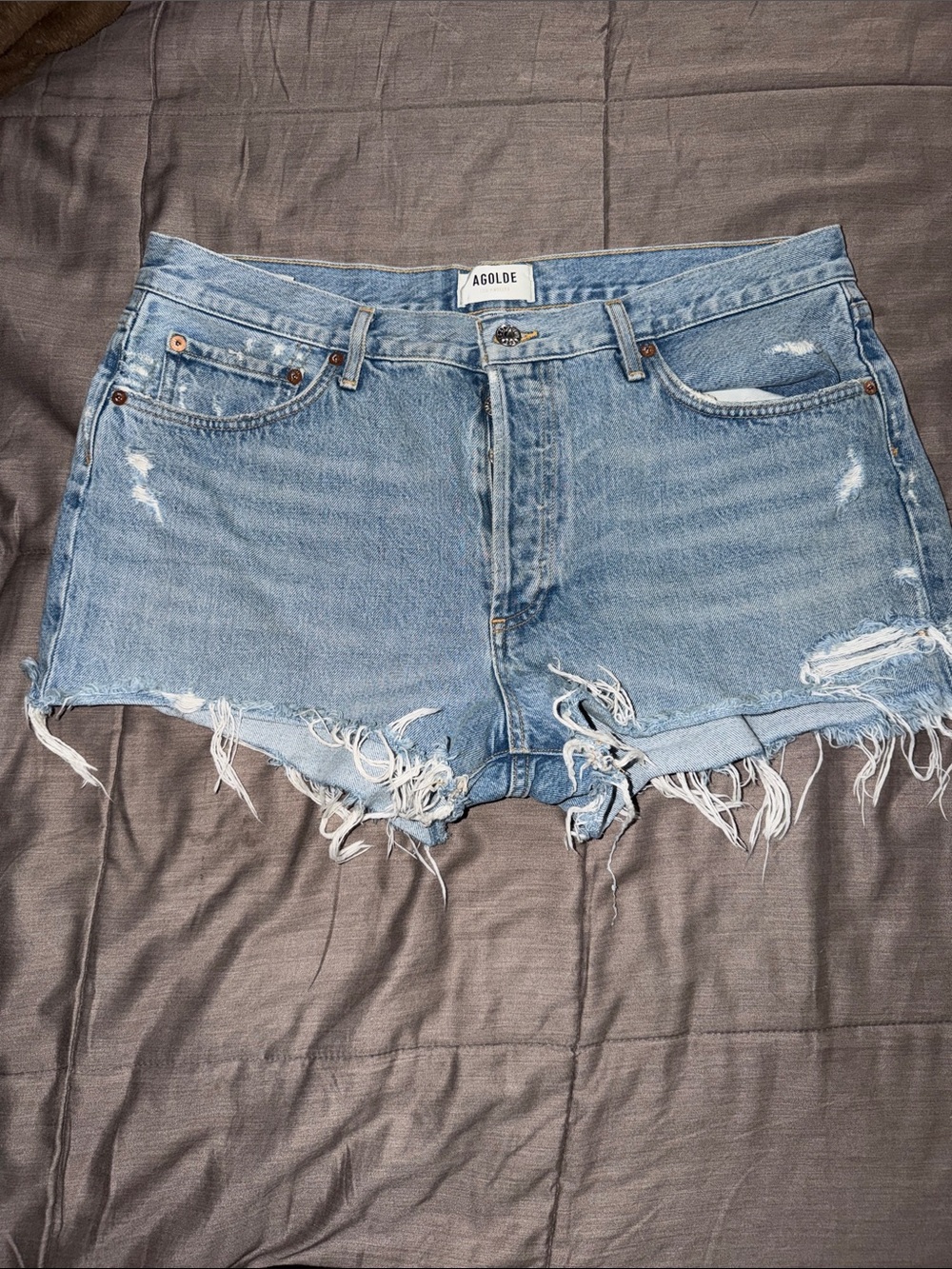 Agolde Light Blue Distressed Denim Cutoff Shorts